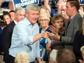 Conservative leader Stephen Harper greets supporters at a rally  Monday, September 21, 2015  in Peterborough ON..THE CANADIAN PRESS/Ryan Remiorz