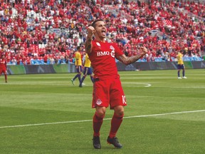 Toronto FC’s Sebastian Giovinco celebrates after scoring against Colorado on Saturday. (THE CANADIAN PRESS)