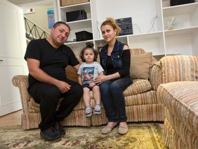 Iraqi Saifan Istefan, his Syrian wife, Talar Donian, and their son, Zenos, 2, have fled violence in their homelands for the safety of London, where they share a home provided by sponsors at King?s University College with another refugee family from the war-torn region. (CRAIG GLOVER, The London Free Press)