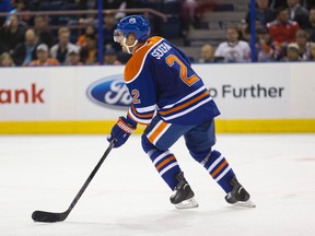 Edmonton Oilers' Andrej Sekera (2) skates up ice versus the Calgary Flames during the second period of a pre-season NHL game at Rexall Place in Edmonton, Alta. on Monday September 21, 2015. Ian Kucerak/Edmonton Sun/Postmedia Network