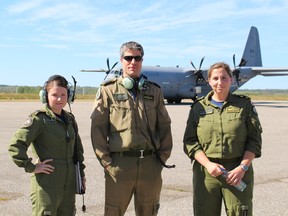 Skye Simpson, Torrey Price and Cynthia Blanchet were three of the four staff that were aboard the CC-130J Hercules which stopped for about a half hour at the Cochrane Airport Sept 14.