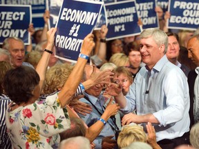 Conservative leader Stephen Harper greets supporters at a rally in Peterborough, Ont., on Sept. 21, 2015. (THE CANADIAN PRESS/Ryan Remiorz)