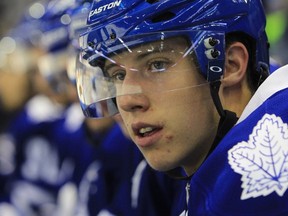 Toronto Maple Leafs' Mitch Marner watches the action from the bench at the 2015 NHL Rookie Tournament Friday September 11, 2015 in London, Ontario. (THE CANADIAN PRESS/Dave Chidley)