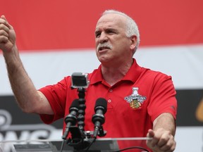 Head coach Joel Quenneville of the Chicago Blackhawks speaks to the crowd during the Stanley Cup Championship Rally at Soldier Field in Chicago on June 18, 2015. (Jonathan Daniel/Getty Images/AFP)