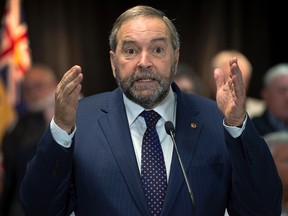 NDP leader Tom Mulcair fields a question during a campaign stop at the Royal Canadian Legion in Dartmouth,  N.S. on Monday, Sept. 21, 2015. THE CANADIAN PRESS/Andrew Vaughan