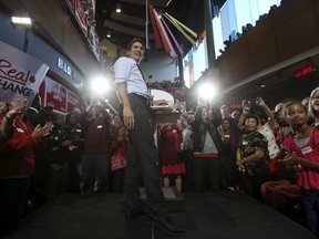 Liberal leader Justin Trudeau reacts during a campaign rally in Ottawa, Canada September 21, 2015. Canadians go to the polls in a national election on October 19, 2015. REUTERS/Chris Wattie