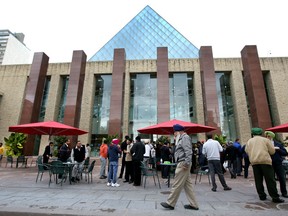 Cab drivers have lunch at City Hall during a break in city council meetings regarding Uber in Edmonton, Alta., on September 21, 2015.