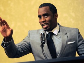In this July 26, 2013 file photo, Sean "Diddy" Combs of the new network Revolt TV addresses reporters at the Beverly Hilton Hotel in Beverly Hills, Calif.   (Photo by Chris Pizzello/Invision/AP, File)
