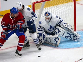 Toronto Maple Leafs goalie Garret Sparks (31) makes a save as Montreal Canadiens centre Gabriel Dumont (37) and Leafs forward William Nylander battle in front of the net during NHL pre-season play at Bell Centre Tuesday. (Jean-Yves Ahern/USA TODAY Sports)