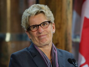 Premier Kathleen Wynne announces hat beer will be in grocery stores by Christmas in Toronto, Ont. on Wednesday September 23, 2015. Craig Robertson/Toronto Sun/Postmedia Network