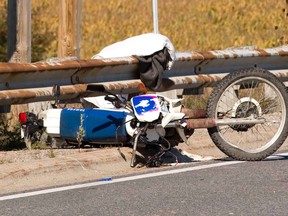 A motorcyclist suffered life threatening injuries from a collision with a pickup truck on Iona Road at Hwy 401 in Dutton, Ont. on Wednesday September 23, 2015. (DEREK RUTTAN, The London Free Press)