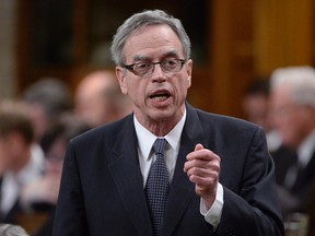 Finance Minister Joe Oliver responds to a question during question period in the House of Commons in Ottawa, in this May 11, 2015 file photo. (THE CANADIAN PRESS/Adrian Wyld)