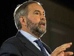 NDP leader Tom Mulcair addresses supporters during a campaign stop in Montreal on Wednesday, Sept. 23, 2015. THE CANADIAN PRESS/Andrew Vaughan