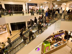 Shoppers walk between stores at West Edmonton Mall in Edmonton on Saturday, December 22, 2012. Ian Kucerak/Edmonton Sun/QMI Agency