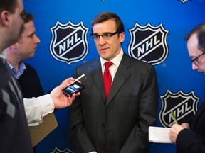 Washington Capitals GM George McPhee speaks to media before Commissioner Gary Bettman announces the end of labor negotiations between the NHL and NHLPA in New York on Jan. 9, 2013. (REUTERS/Lucas Jackson)