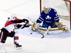 Toronto Maple Leafs goalie Lucas Peressini stops a shot by Ottawa Senators forward Ryan Dzingel during an NHL Rookie Tournament game at Budweiser Gardens in London, Ont., on Sept. 11. The Leafs returned Peressini to the Kingston Frontenacs this week. (Craig Glover/Postmedia Network)