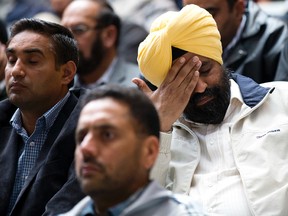 Taxi drivers watch as City Council discusses a ride service bylaw, in Edmonton Alta. on Tuesday Sept. 22, 2015. David Bloom/Edmonton Sun
