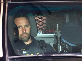 Basil Borutski leaves in a police vehicle after appearing at the courthouse in Pembroke, Ont. on Wednesday, Sept. 23, 2015. Borutski has been charged with three counts of first-degree murder in the separate slayings of three women whose deaths sparked a lockdown and manhunt in an ordinarily peaceful area of eastern Ontario on Tuesday.THE CANADIAN PRESS/Justin Tang