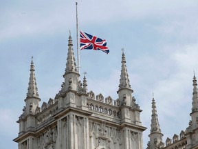 The Union flag flies at half-mast on the roof of Westminster Abbey in London, Britain July 3, 2015.   REUTERS/Peter Nicholls
