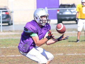 Lo Ellen Knights  game changer of the week Noah Skuce makes a catch during team practice in Sudbury, Ont. on Wednesday September 23, 2015. Gino Donato/Sudbury Star/Postmedia Network