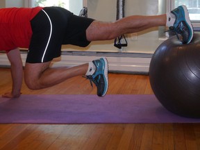 The Stability Long Arm Jackknife is among a superset of exercises that will help you attain ‘six-pack’ abs. (Supplied photo)