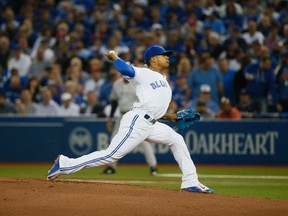 Blue Jays starting pitcher Marcus Stroman delivers on Wednesday night against the Yankees in Toronto. Stroman, making his third start of the season, was solid was again. (STAN BEHAL/TORONTO SUN)