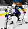 The Edmonton Oilers' Justin Schultz (19) battles the Winnipeg Jets' Alex Burmistrov (6) during second period NHL action, in Edmonton Alta. on Wednesday Sept. 23, 2015. David Bloom/Edmonton Sun/Postmedia Network