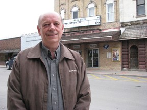 Glen Starkey, with the Kiwanis Club of Forest, is shown in a file photo standing across the street from the Kineto theatre the service club has operated in Forest since 1977. A fall concert series opens Oct. 1 at the theatre with a show by the band Upside of Maybe.
File photo/THE OBSERVER