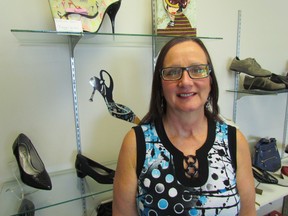 Valerie Young, shown at her store The Shoebox, Thursday September 24, 2015 in Sarnia, Ont., is a breast cancer survivor. This year, she was named a CIBC Run for the Cure Local Hero. The run is set for Oct. 4 in Canatara Park. (Paul Morden/Sarnia Observer/Postmedia Network)