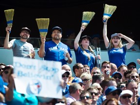 Fans celebrate the Toronto Blue Jays' series sweep of the Oakland Athletics during MLB baseball action in Toronto on Aug. 13, 2015. (THE CANADIAN PRESS/Darren Calabrese)