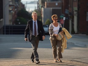 Dennis Oland, accompanied by his mother Constance Oland, arrives for the start of his trial in Saint John, N.B. on Wednesday, Sept. 16, 2015. Oland is charged with second degree murder in the death of his father. Richard Oland, 69, was found dead in his Saint John office on July 7, 2011. (THE CANADIAN PRESS/Andrew Vaughan)