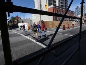 People walk all around a construction zone on Rideau Street in Ottawa Ontario Thursday Sept 24, 2015.  Tony Caldwell/Ottawa Sun/Postmedia Network