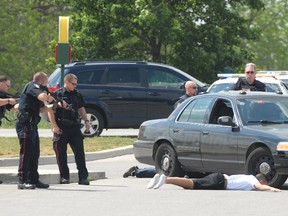 Stratford Police conduct a high-risk takedown in the city's south end on May 24, 2012. SCOTT WISHART/The Beacon Herald files