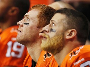 Mike Reilly, right, and Travis Lulay, teammates on the Lions in 2012, rarely play against each other as one or the other seems to be injured whenever the teams play each other. (Reuters)