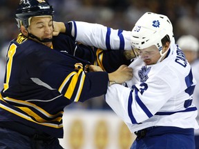Toronto Maple Leafs centre Sam Carrick (53) fights Buffalo Sabres winger Chris Stewart at First Niagara Center last year. (Kevin Hoffman/USA TODAY Sports)