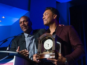Ex-Blue Jays greats Joe Carter (left) and Roberto Alomar at the Ontario Sports Hall of Fame induction dinner. (Ernest Doroszuk, Toronto Sun)