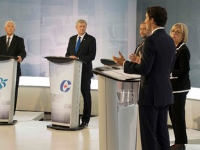 From left: Bloc Quebecois leader Gilles Duceppe, Conservative leader Stephen Harper, NDP leader Tom Mulcair, Green party leader Elizabeth May and Liberal leader Justin Trudeau debate in the French language leaders debate in Montreal September 24, 2015. Canadians go to the polls in a federal election on October 19, 2015.   REUTERS/Adrian Wyld/Pool