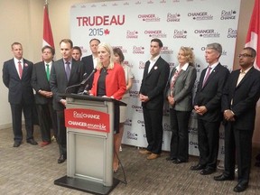 Catherine McKenna, the Liberal candidate in Ottawa Centre, talks about the party's plans for the public service with other Liberal candidates in the region on Friday, Sept. 25, 2015. (JON WILLING Ottawa Sun / Postmedia Network)