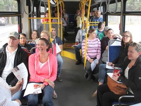 On one of the twice-annual Seeing is Believing Tours, workplace campaign volunteers for the United Way take a bus in Kingston, Ont. on Friday, Sept. 25, 2015 to visit five of the agencies the United Way supports. Michael Lea/The Whig-Standard/Postmedia Network
