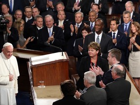 Pope Francis exits the house after speaking at a joint meeting of the U.S. Congress in the House Chamber of the U.S. Capitol on September 24, 2015 in Washington, D.C. Win McNamee/Getty Images/AFP