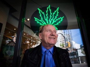 Don Briere, owner of 15 Weeds Glass & Gifts medical marijuana dispensaries, stands for a photograph outside one of his locations in downtown Vancouver, B.C., on May 1, 2015. Medical marijuana dispensary owners who stand to be uprooted by Vancouver's sweeping new regulations say they won't disappear without a fight. THE CANADIAN PRESS/Darryl Dyck