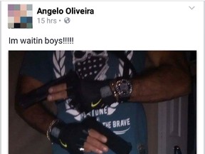 Accused's Facebook police showing him brandishing what police believe were two pistols. (Supplied Photo)