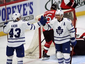 Maple Leafs’ Joffrey Lupul (right) celebrates his overtime winner with teammate Nazem Kadri during pre-season action against the Senators earlier in the week. Lupul has returned to camp claiming to have packed on 10 pounds of muscle through a new summer workout regiment and hopes for a bounce-back season. (THE CANADIAN PRESS)