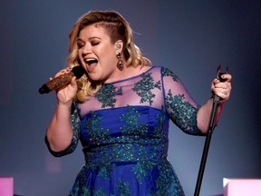 Singer Kelly Clarkson performs 'Heartbeat Song' onstage during the 2015 iHeartRadio Music Awards which broadcasted live on NBC from The Shrine Auditorium on March 29, 2015 in Los Angeles, California.  Kevin Winter/Getty Images for iHeartMedia/AFP
