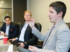 Uber Canada executives met with the Toronto Sun Editorial Board on Sept.25, 2015. Left to right are Xavier Van Chau, communications lead, Andrew Macdonald, regional general manager, and Chris Schafer. (Stan Behal/Toronto Sun)