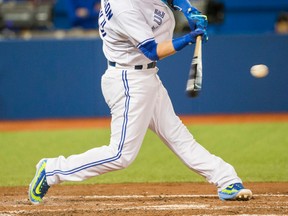 Josh Donaldson of the Toronto Blue Jays his his 40th home run of the season against the Tampa Bay Rays at the Rogers Centre in Toronto, Ont. on Sept. 25, 2015. (ERNEST DOROSZUK/Toronto Sun)