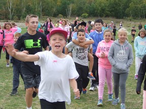 Holy Cross elementary school students participate in the second-annual mini Run for the Cure event Friday. HAROLD CARMICHAEL/The SUDBURY STAR