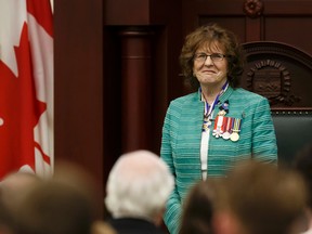 Lt.-Gov. Lois Mitchell reads the Speech From The Throne on the floor of the Alberta Legislature in Edmonton, Alta., on Monday June 15, 2015. The Speech From The Throne marks the beginning of the 29th Legislature. Ian Kucerak/Edmonton Sun/Postmedia Network