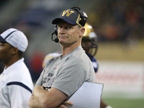 Winnipeg Blue Bombers head coach Mike O'Shea looks on late in a loss to the Calgary Stampeders in CFL action at Investors Group Field in Winnipeg on Fri., Sept. 25, 2015. (Kevin King/Winnipeg Sun/Postmedia Network)