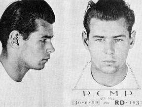 July 13th, 1959, RCMP mugshot of Robert Raymond Cook the last person hanged in Alberta. On July 11, 1959 Robert Cook escaped from the Ponoka Mental Hospital, he stole a car during a police chase the vehicle crashed a rolled-over. Cook escaped into the bushes, on July 13th Cook was captured at a farm near Bashaw. In June of 1959, seven bodies of the Cook family were discovered by RCMP officers in their home in Stettler, Alta. Family member Robert Raymond Cook, 21 was charged with the murders. On Nov. 15, 1960, Robert Raymond Cook became the last person to be hanged in Alta.